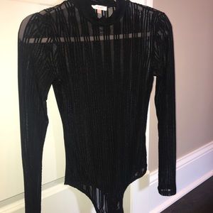 Black mesh body suit